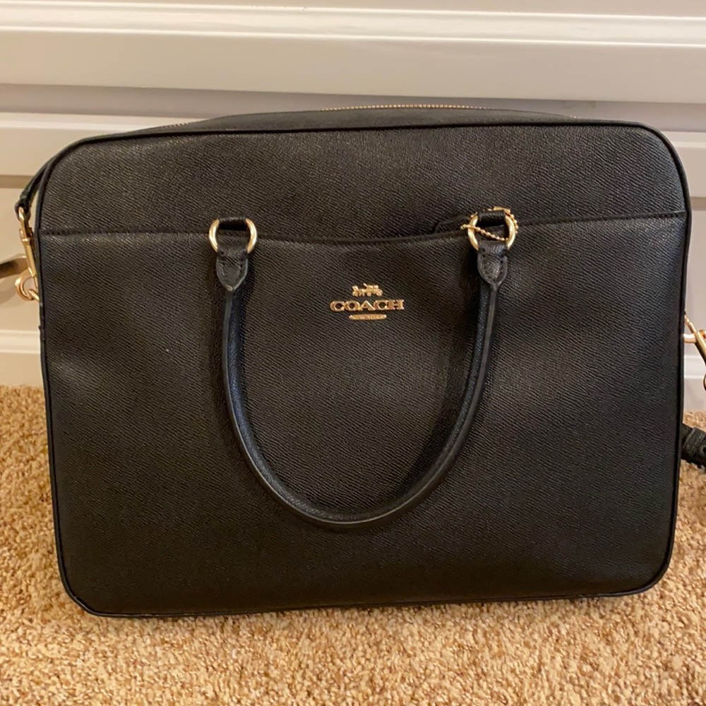 Briefcase, large purse or laptop bag from Coach. NWOT. Never used.